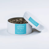 Jasmine Pearls green loose leaf tea in an open tin