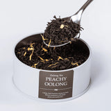 Peachy Oolong loose leaf tea with a teaspoon