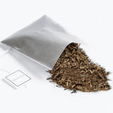 Great White tea spilling out of a Soilon tea bag