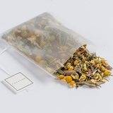 Serenity tea spilling out of a Soilon tea bag