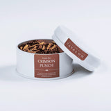 Crimson Punch fruity loose leaf tea in an open tin