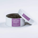 Earl Grey Reserve black loose leaf tea in an open tin