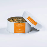 Serenity herbal loose leaf tea in an open tin