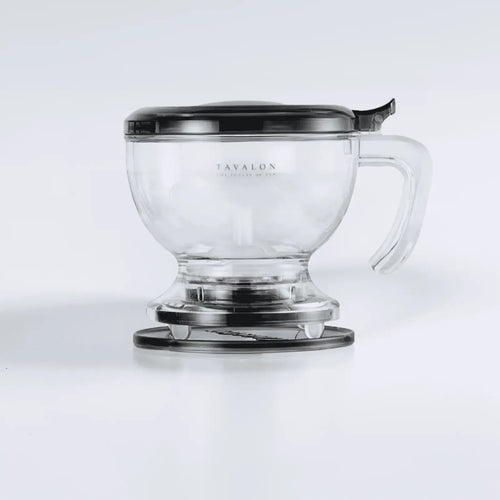 A clear Gravity Teapot from the teaware sets by Tavalon