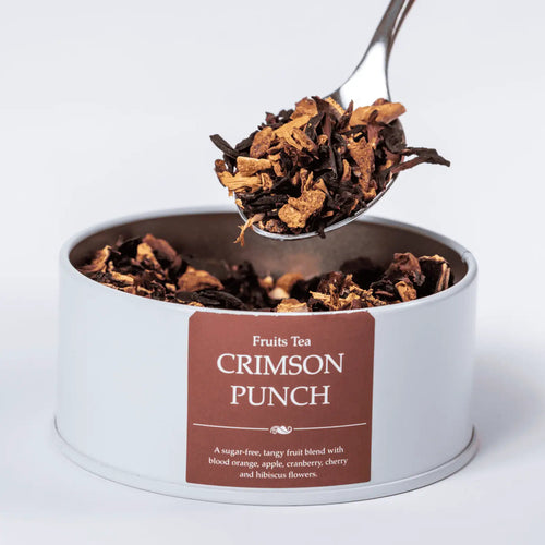Crimson Punch fruity loose leaf tea with a teaspoon