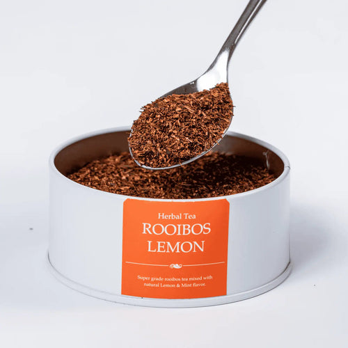 Rooibos Lemon herbal loose leaf tea with a teaspoon