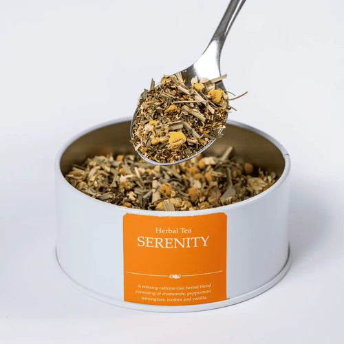 Serenity herbal loose leaf tea with a teaspoon