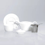 A Tavalon Rondi for One set from teaware sets by Tavalon, including a white porcelain teacup, saucer, teapot, and stainless steel infuser.