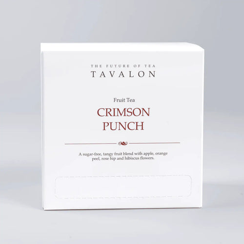 Tavalon Crimson Punch fruit tea packaging on a gray background
