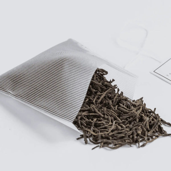 Earl Grey Reserve tea spilling out of a Soilon tea bag