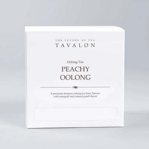 Tavalon Peachy Oolong tea packaging on a gray background