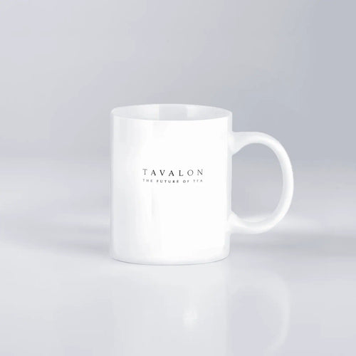 White mug with 'Tavalon' branding on a light gray background